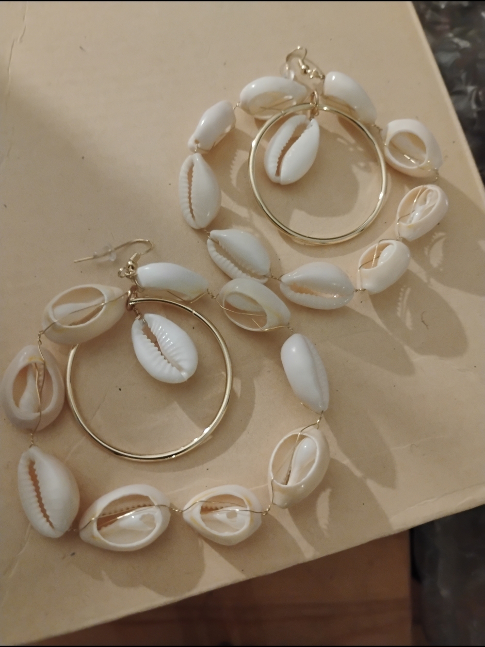 Gold Hoop Earrings with White Cowrie Shells accent